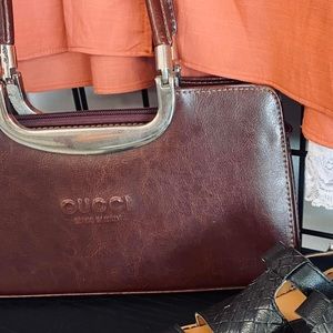 Brown leather handbag, very well made with quality hardware.